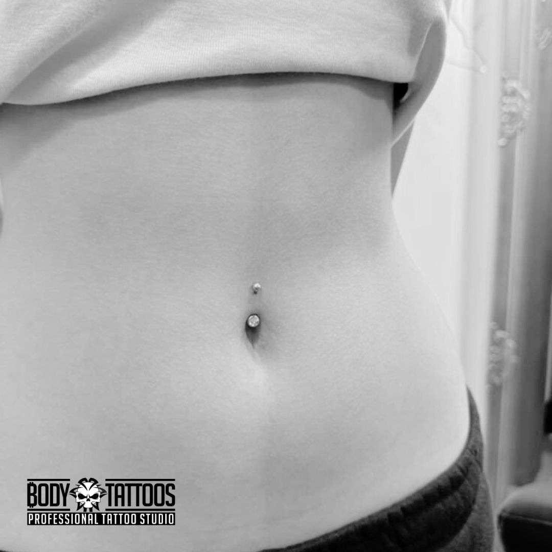 Naval piercing done in body tattoo kalyan
