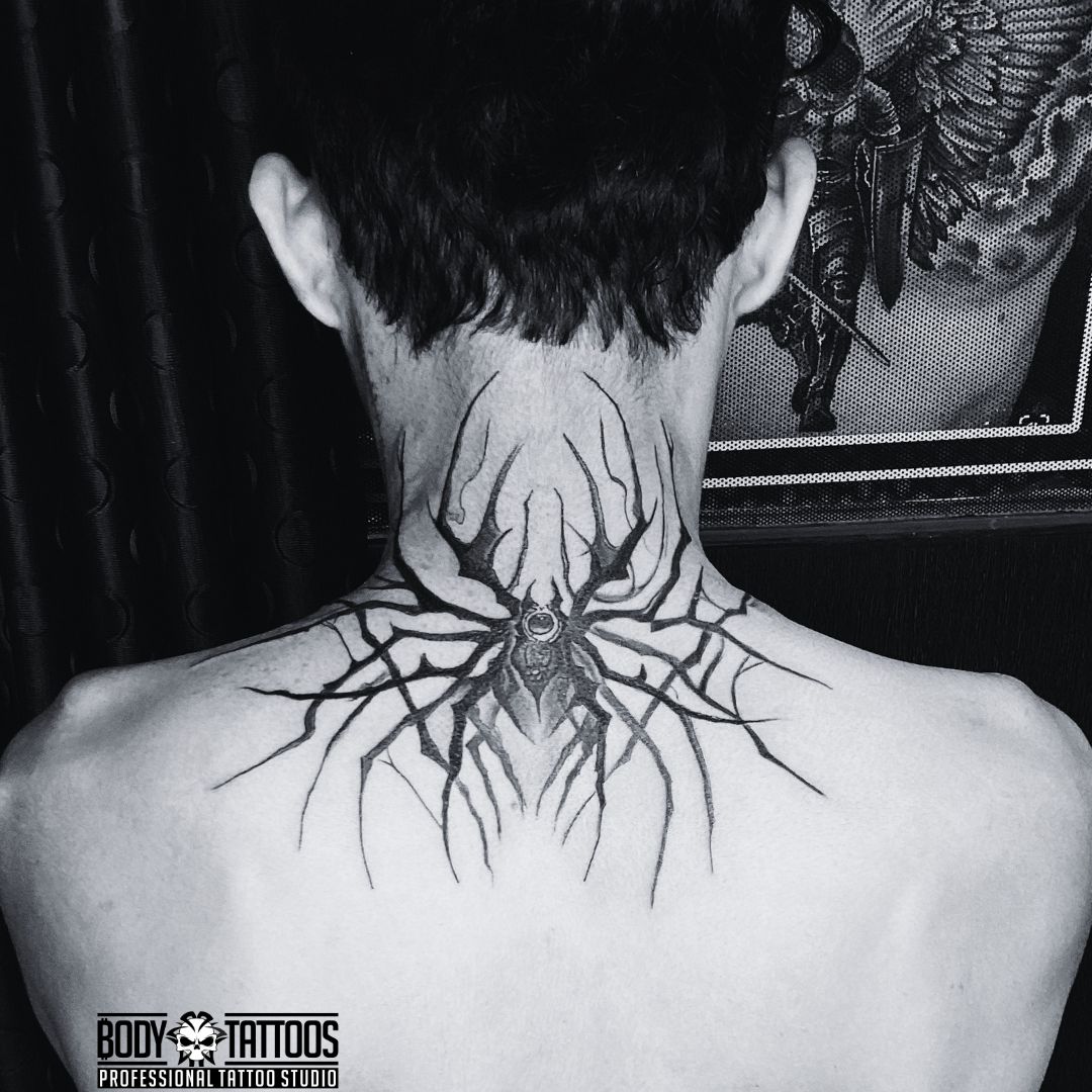 spider neck tattoo made in body tattoo studio kalyan
