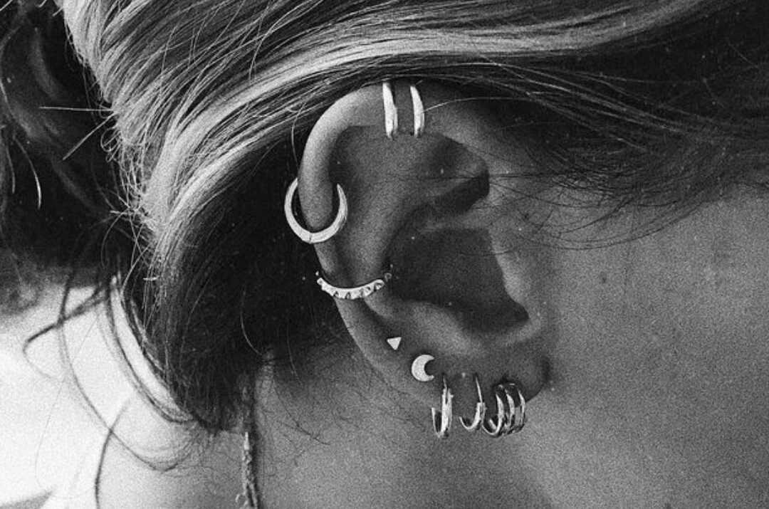Ear piercing done in body tattoo kalyan