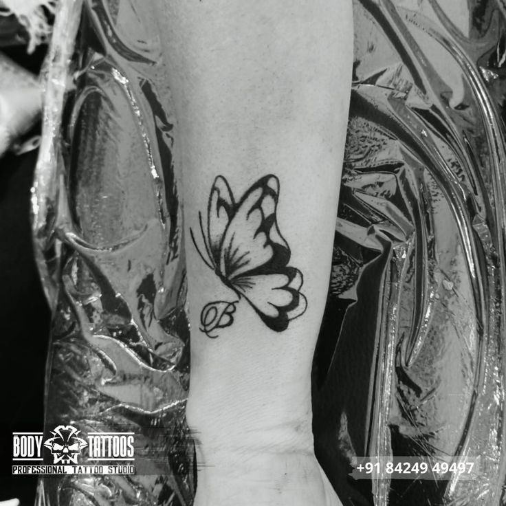 butterfly hand tattoo made in body tattoo studio kalyan