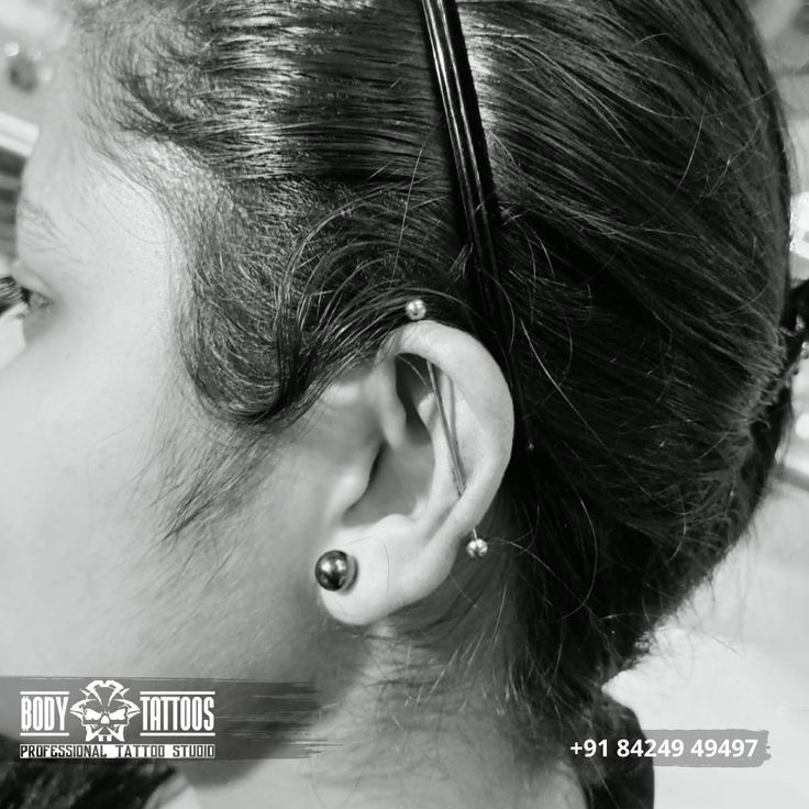 Ear piercing done in body tattoo kalyan